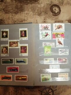 Коллекция марок в альбоме