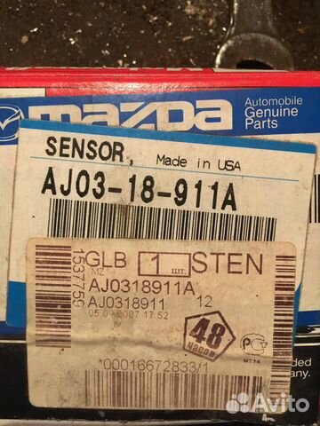 Датчик мазда AJ03-18-911А