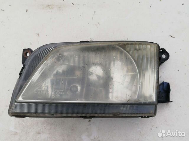 Фара Мазда Демио 1