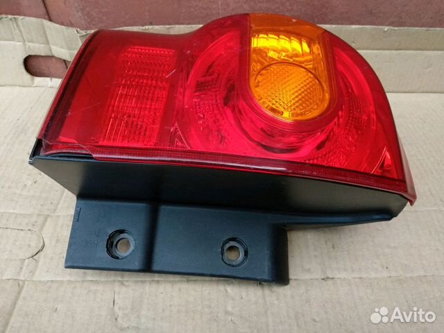 Фонарь Toyota Land Cruiser 200 левый оригинал 1215 Фонарь Toyota Land Cruiser 200 левый оригинал 1215