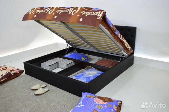 Кровать с подъемным механизмом