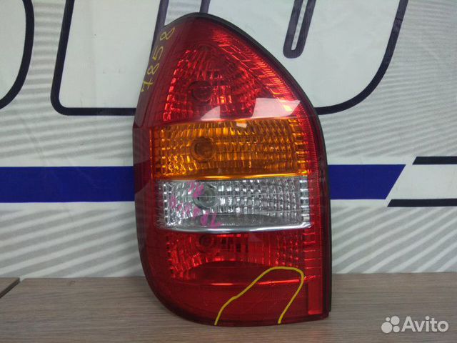 Фонарь задний задний левый Subaru Traviq XM220 Z22