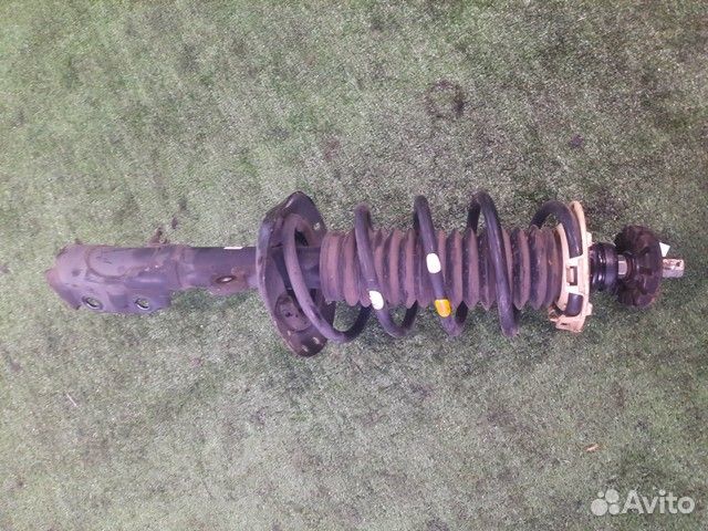 Амортизатор подвески передний левый Honda Fit