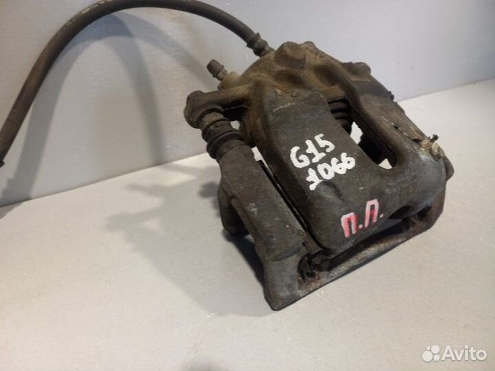 Суппорт передний правый Nissan Almera G15 седан