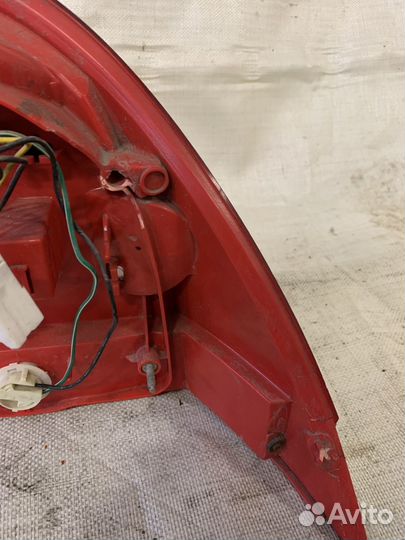 Фонарь левый nissan almera classic