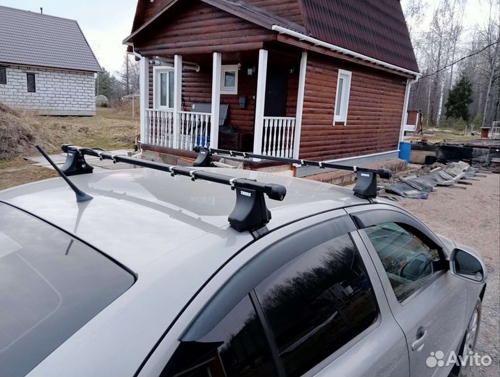 Багажник на крышу thule
