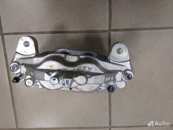 Суппорт тормозной Toyota Land Cruiser (200)