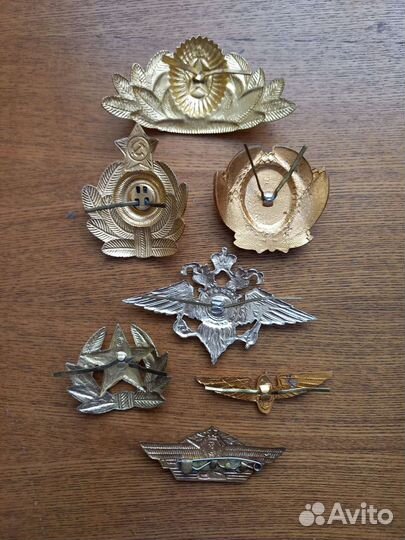 Кокарды и знак