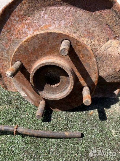 Кулак поворотный передний левый Mitsubishi Lancer