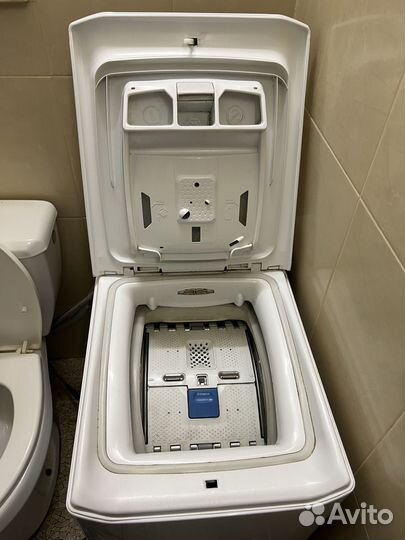 Стиральная машина с вертикальной загрузкой Candy