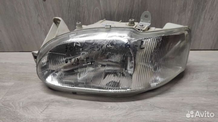 Фара левая форд эскорт