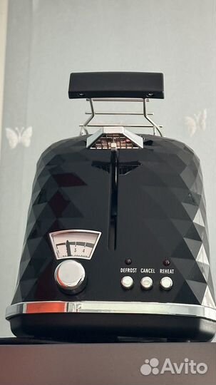 Тостер delonghi