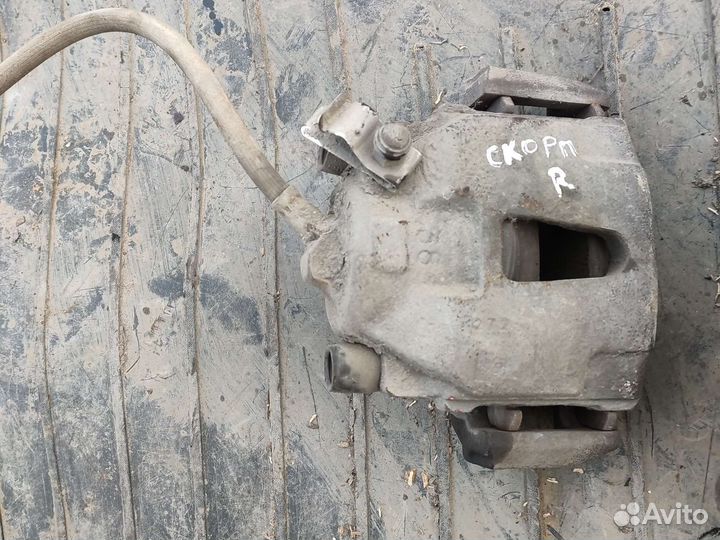 Тормозной суппорт Форд Скорпио 1