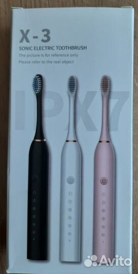 Электрическая зубная щетка