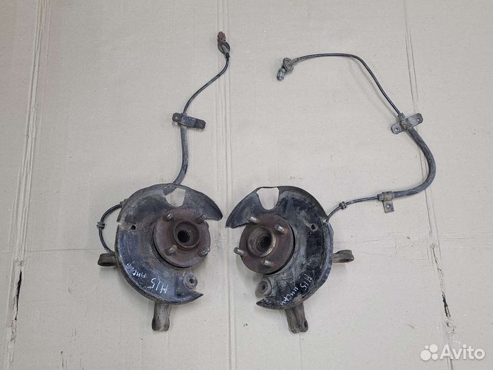 Кулак поворотный правый левый Ниссан Альмера н15