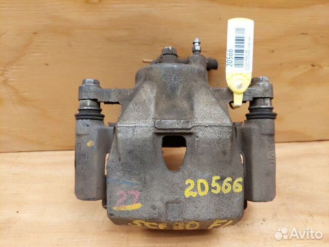 Суппорт передний левый Toyota Vitz SCP90 2szfe