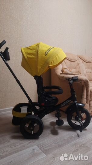 Велосипед трехколесный с поворотным сидением