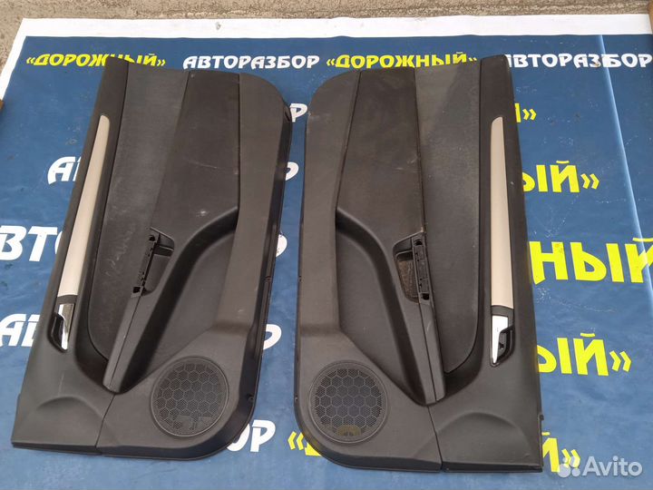 Обшивка передней двери Opel Astra GTC