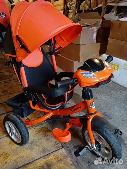 Трехколесный велосипед с ручкой