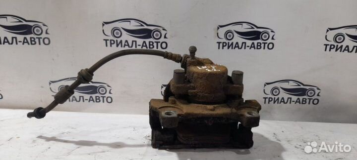 Суппорт тормозной Freelander 2 передний левый