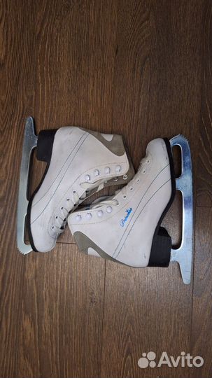 Хоккейные коньки Easton, фигурные коньки Larsen