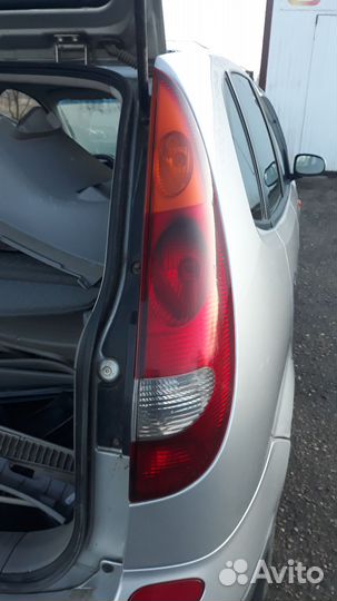 Фонарь задний правый nissan almera tino