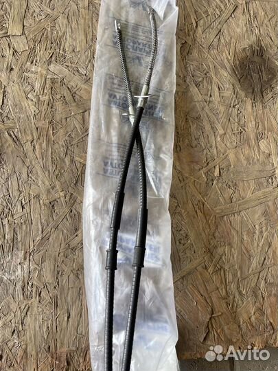 Трос ручника ваз 21010350818000