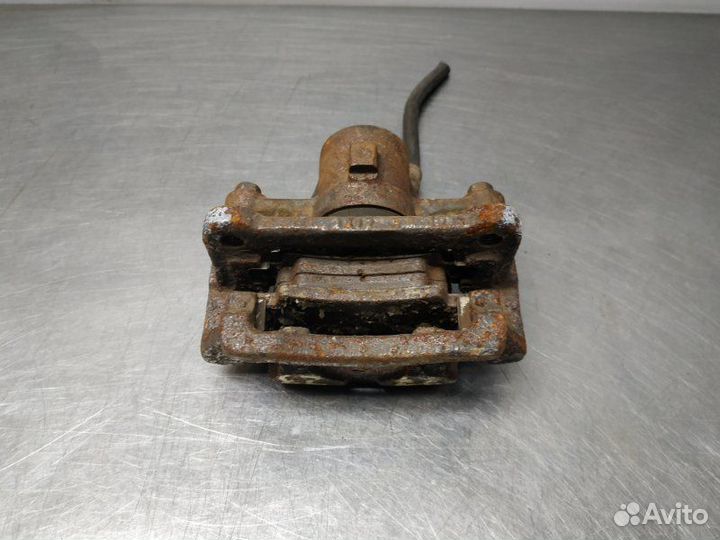 Суппорт задний левый Toyota Corolla 9 E120 4zzfe