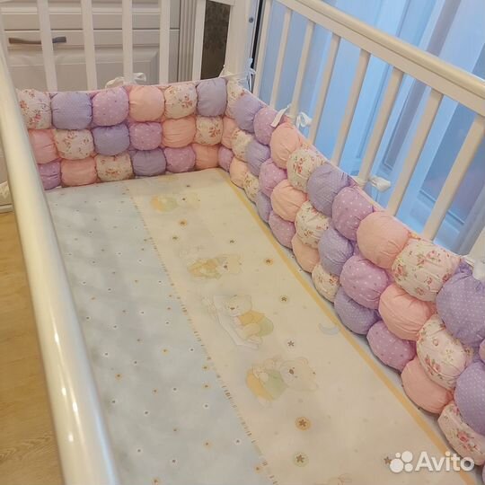 Детская кроватка с продольным маятником