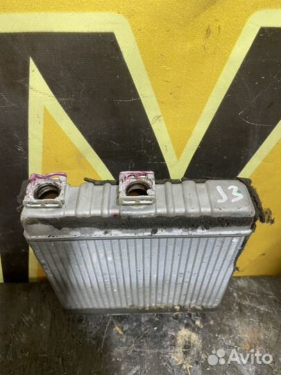 Радиатор печки Опель Астра G