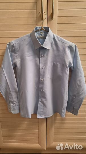 Рубашка на мальчика голубая 128-134