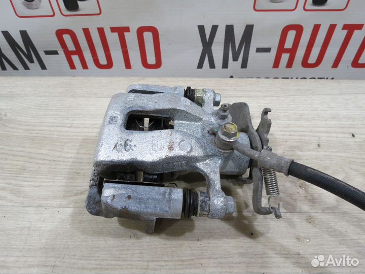 Суппорт тормозной задний левый Hyundai Creta 2