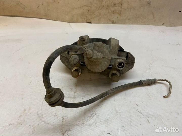 Суппорт передний левый Renault Logan L8 H4M438