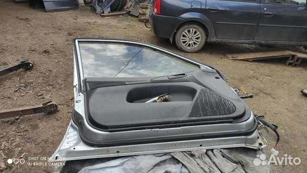 Мицубиси лансер 9 дверь передняя