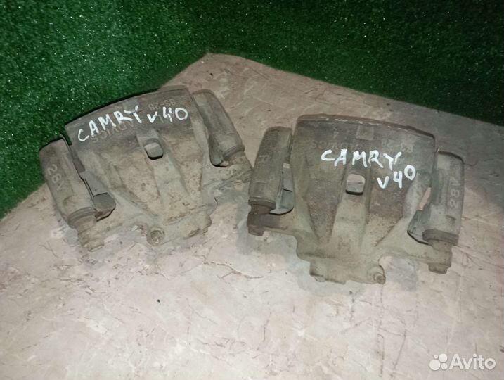 Суппорт тормозной передний Toyota Camry V40