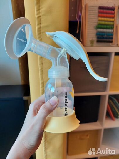 Молокоотсос medela и смартсоска calma