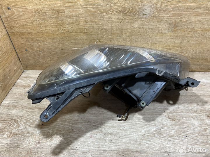 Фара левая Opel Astra H адаптивная 142574