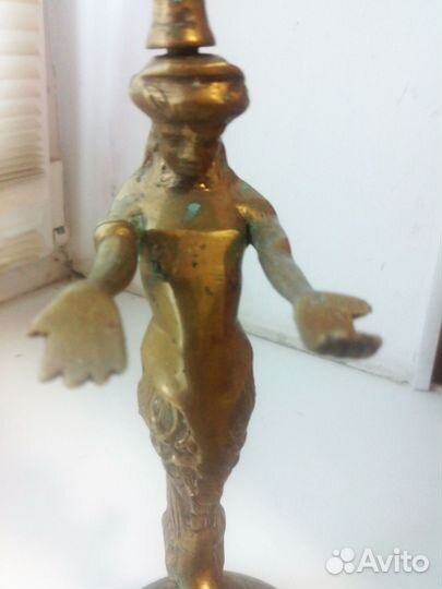 Статуэтка подсвечник