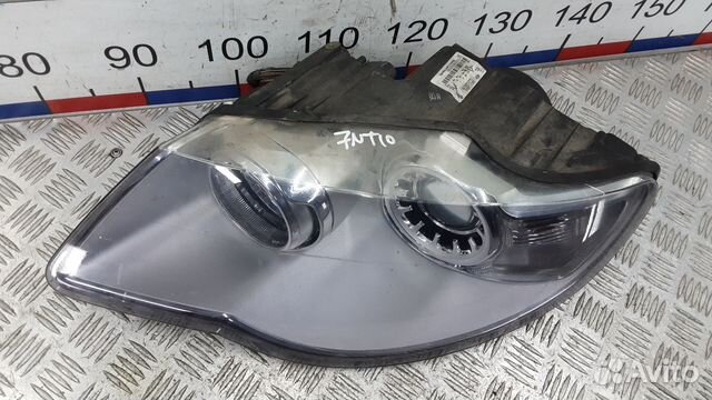 Фара левая Volkswagen Touareg
