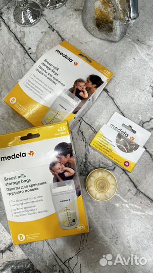 Молокоотсос medela электрический