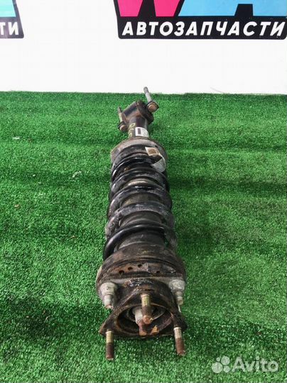 Стойка амортизатора передняя левая Ford Ranger