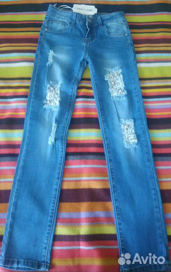 Джинсы для девочки с ажурными вставками