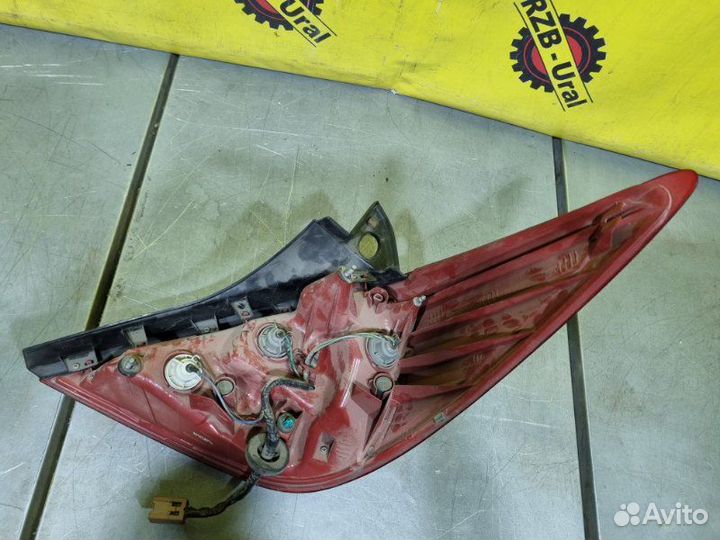 Фонарь задний левый Nissan Tiida 2010-2013