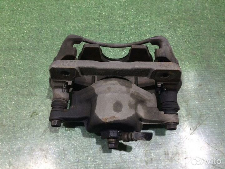 Суппорт тормозной передний левый Honda Accord CF4