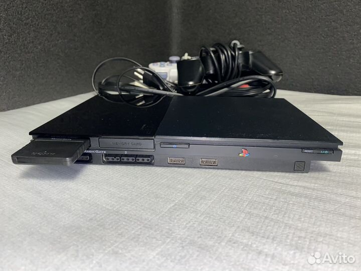 SonyPlaystation 2 slim чипованная + игры