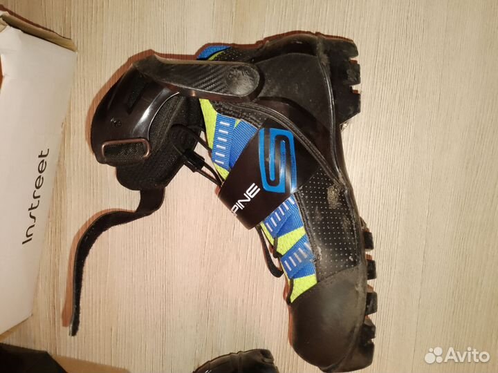 Лыжные ботинки коньковые spine