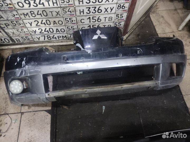 Передний бампер Митсубиси оутлендер