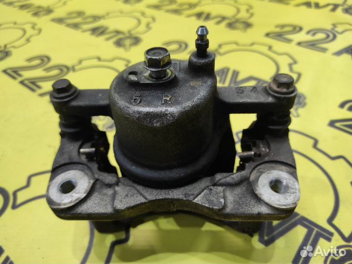 Суппорт передний правый Toyota Vitz NCP91 1nzfe