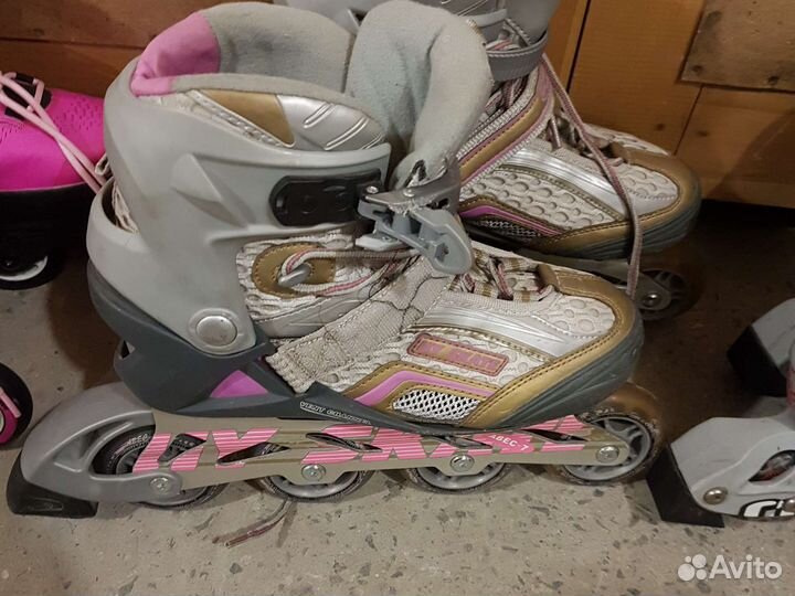 Роликовые коньки
