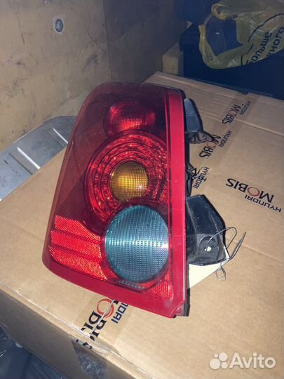 Фонарь задний левый Ниссан Примера Р12